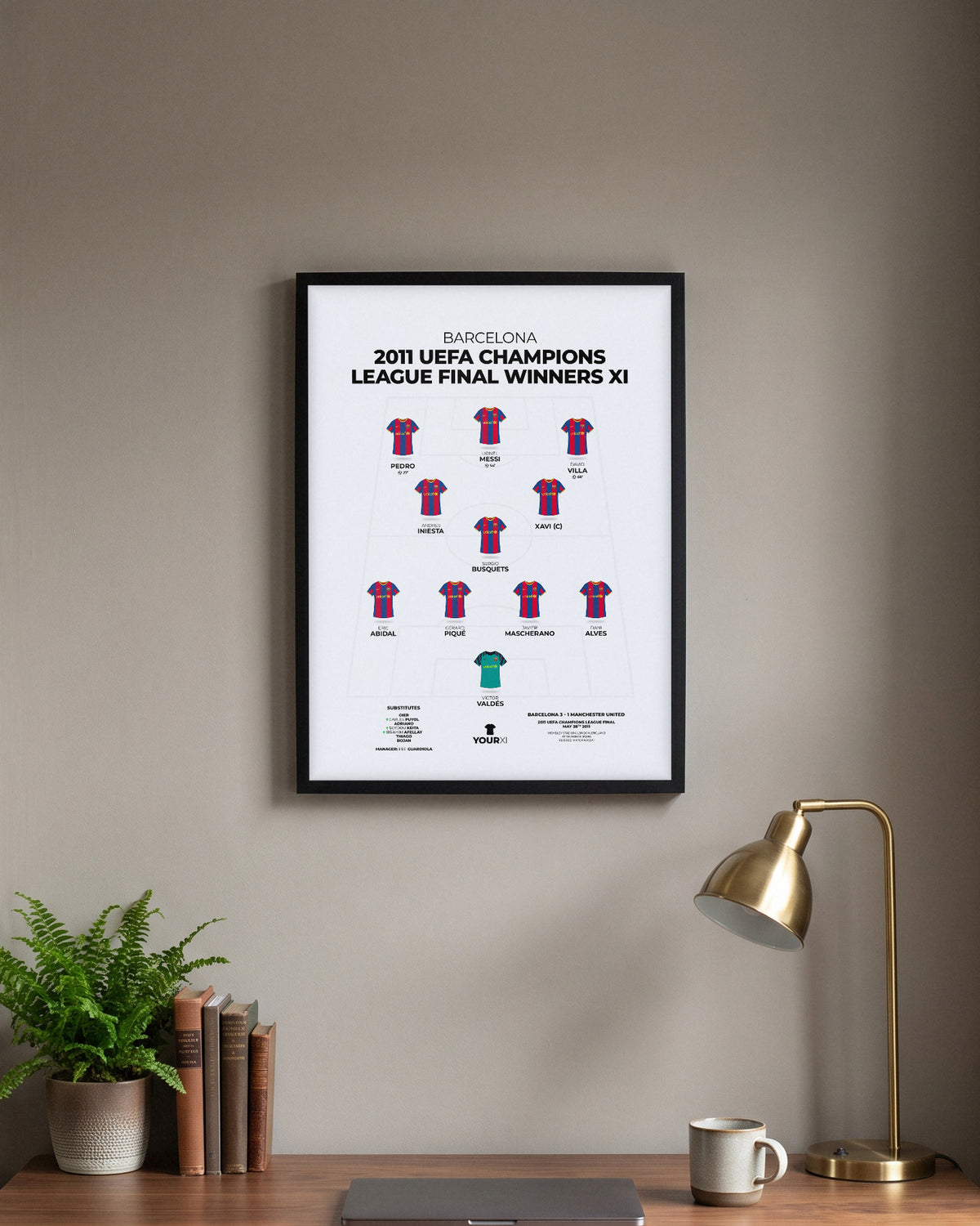 Barcelona 2011 Champions League Final Winners XI framed print, black frame above a desk