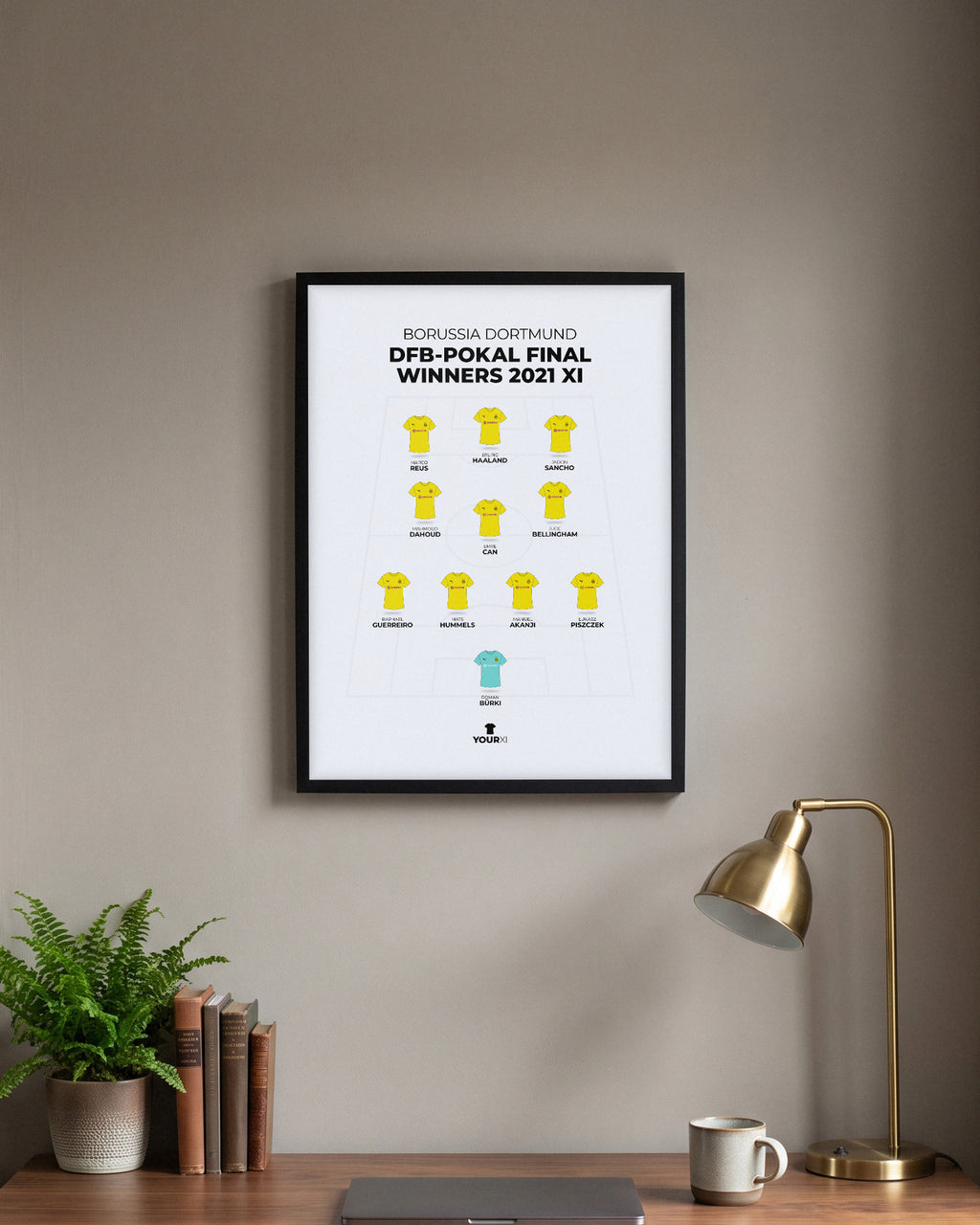 Borussia Dortmund DFB-Pokal Final Winners 2021 XI framed print, black frame above a desk