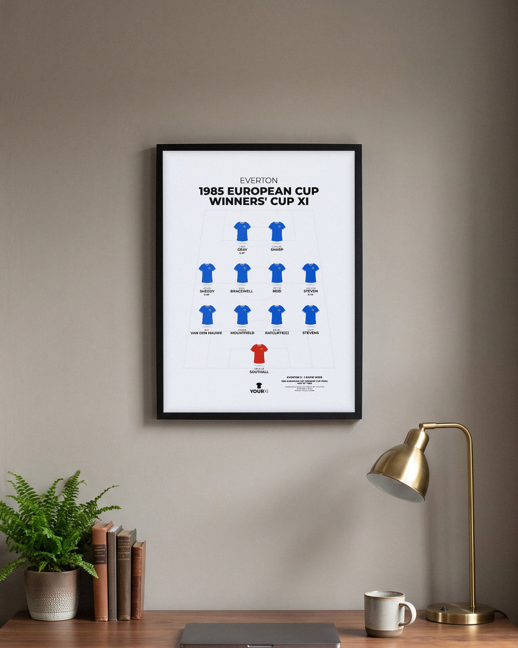 Everton 1985 European Cup Winners' Cup XI framed print, black frame above a desk