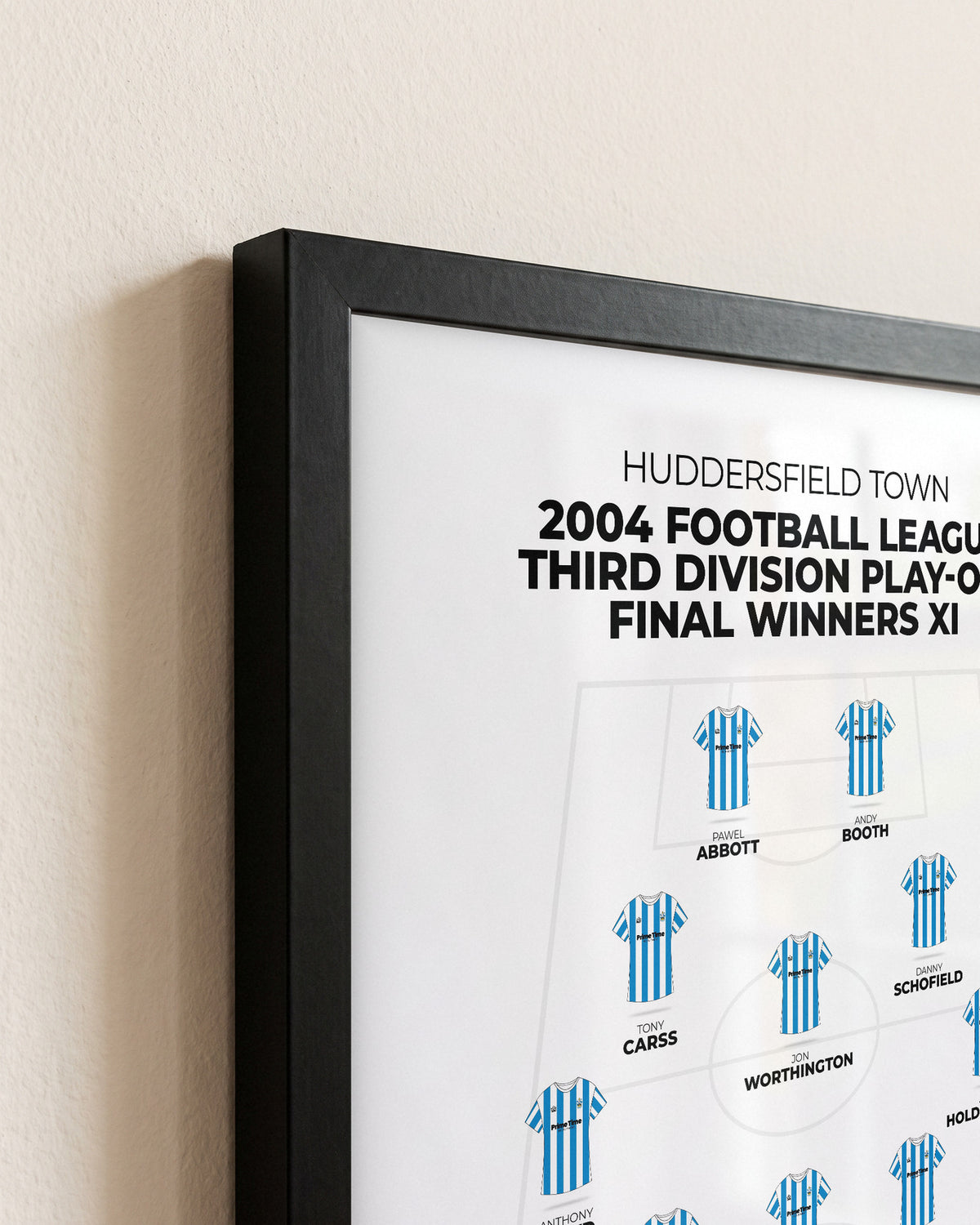 Huddersfield Town 2004 Play-Off Final Winners XI framed print, close-up of the frame corner