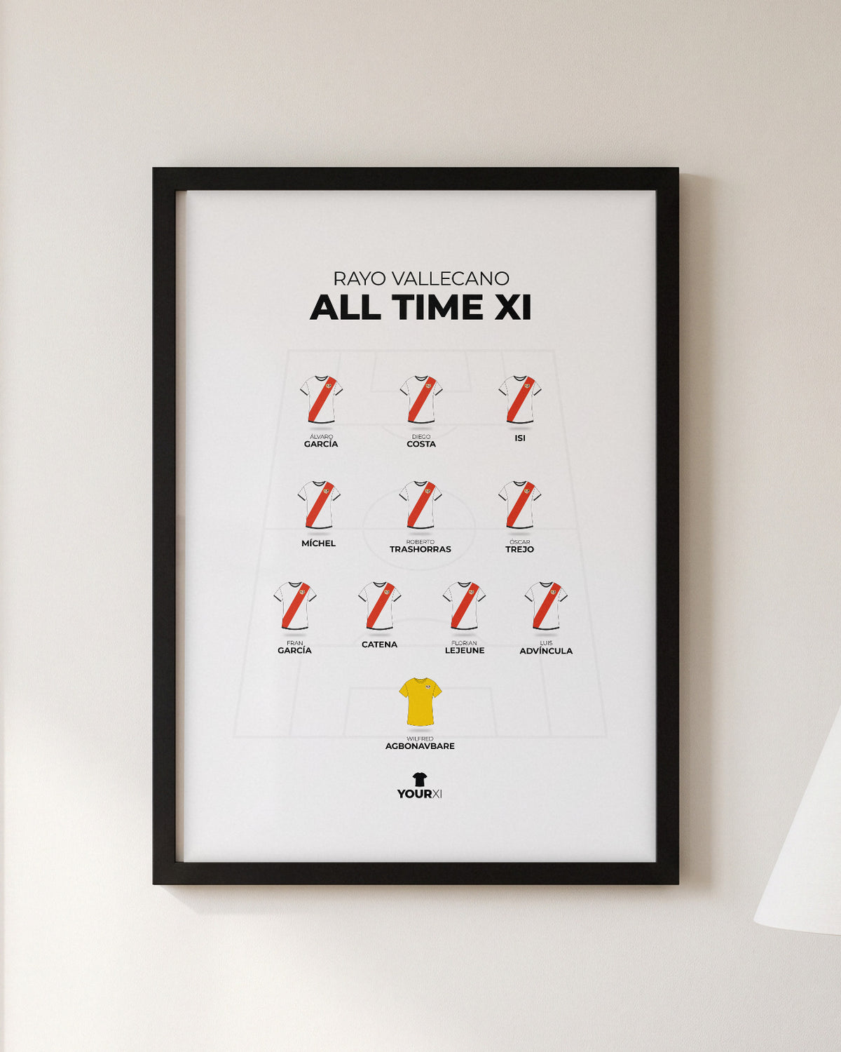 Rayo Vallecano All Time XI framed print, black frame on a wall